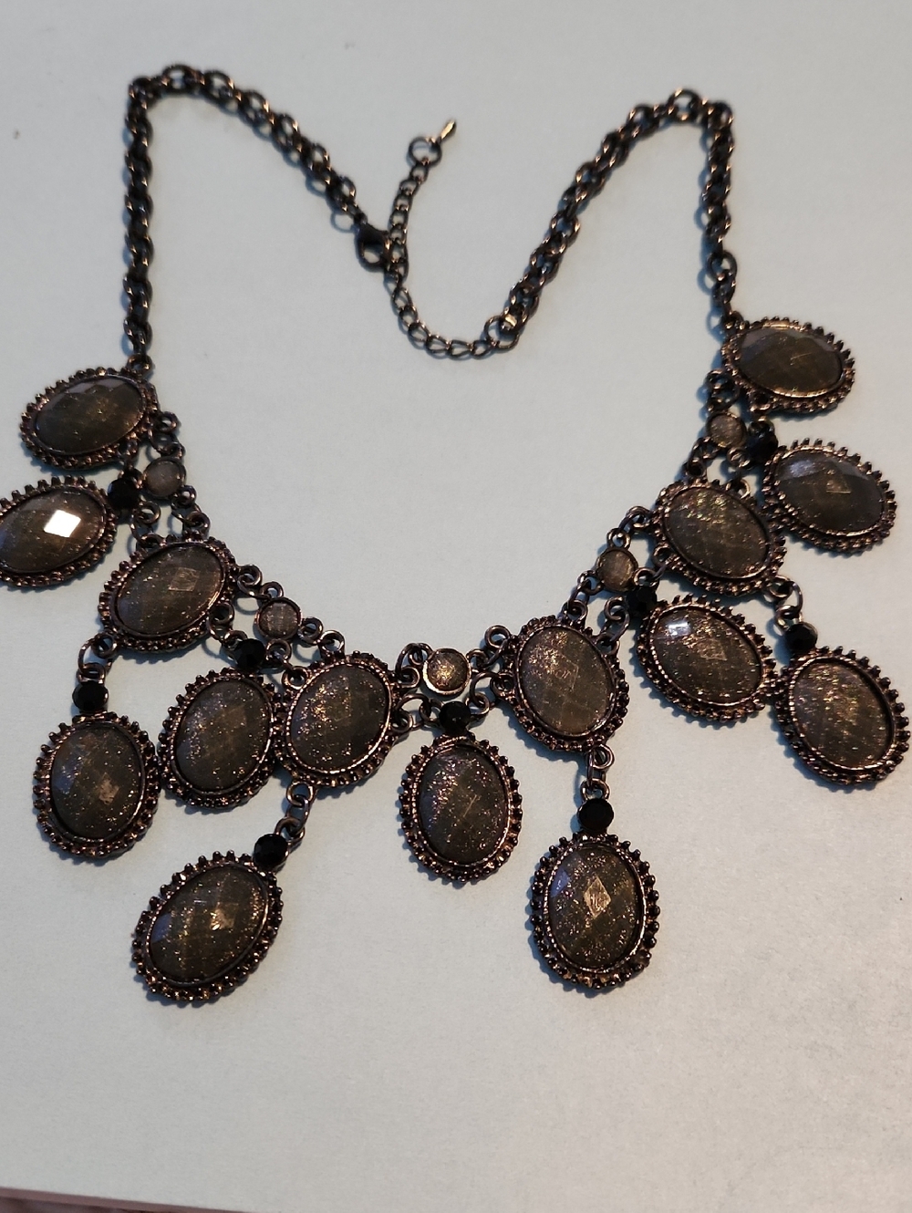 Dark Metallic Oval Fringe Necklace in Black
